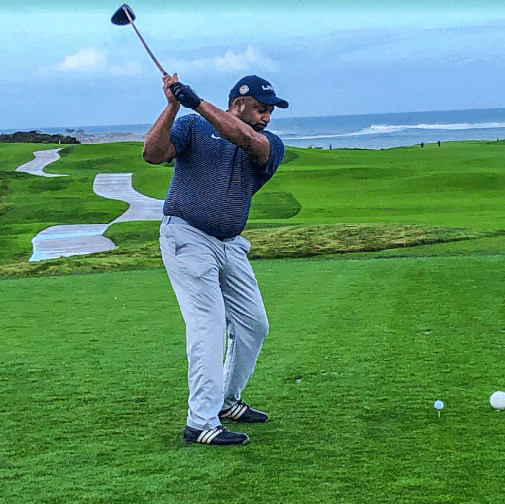 Vivek Sukumaran golfing