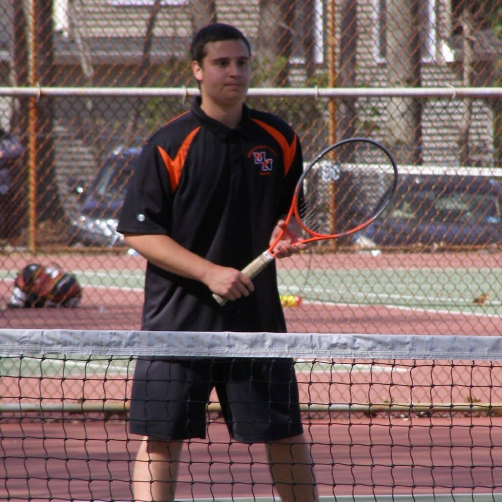 James Lenzi playing tennis