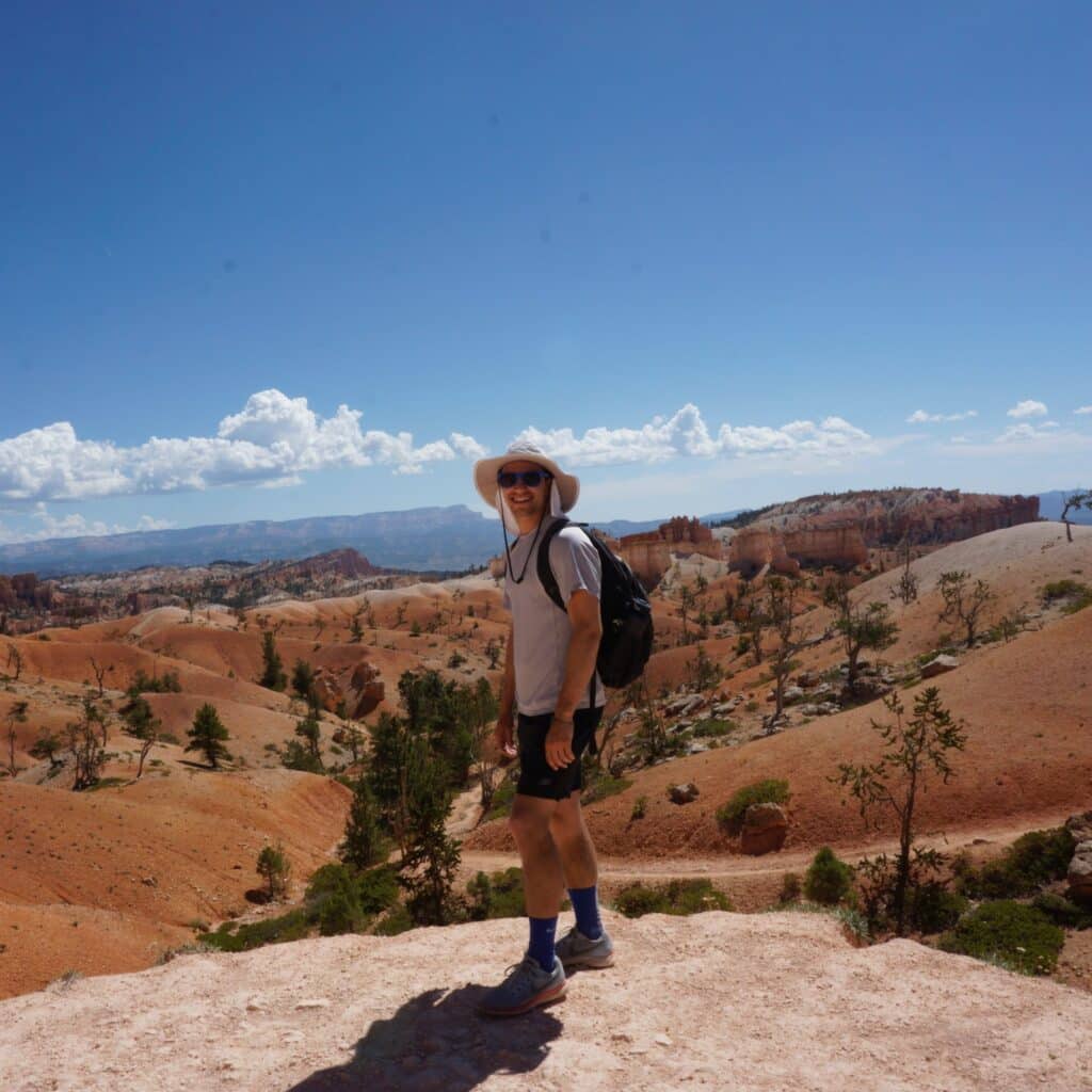 Jeremy Klapper hiking a mountain