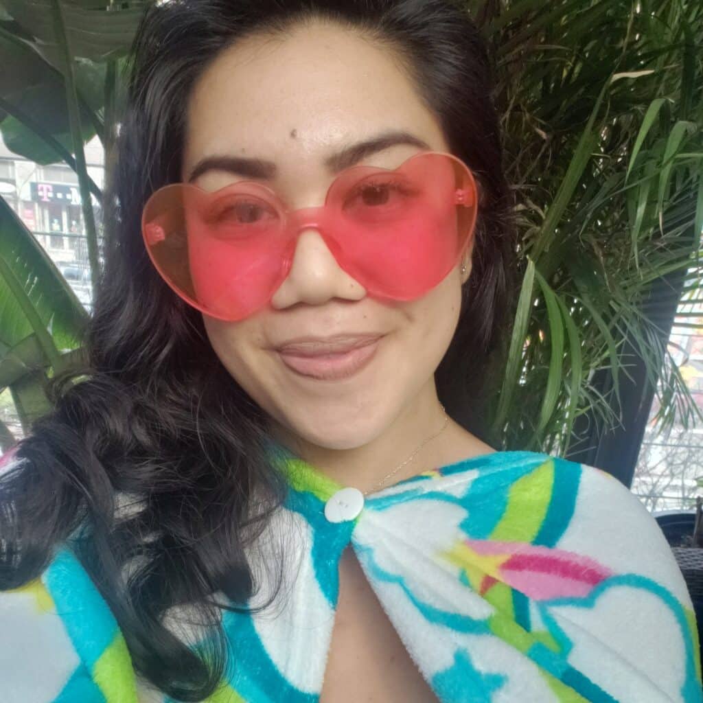 Johanna Sumaria selfie with pink heart shaped sunglasses