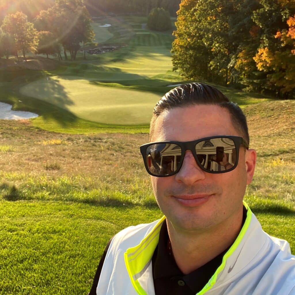 Jon Corti headshot on golf course