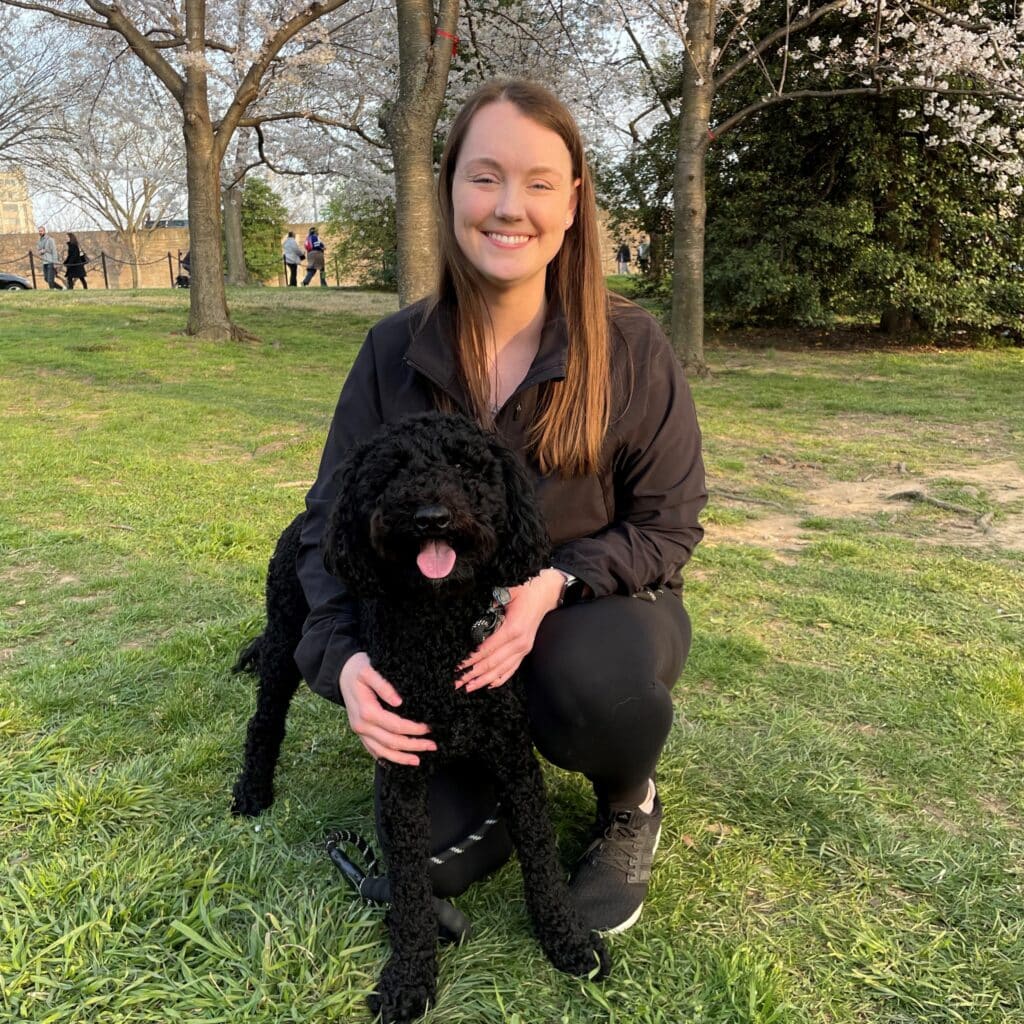 Katie Elifritz outdoors with dog