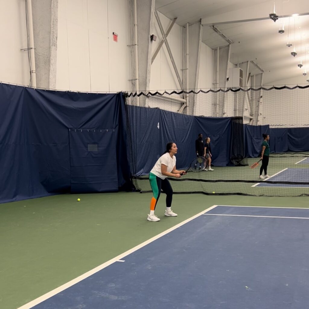 Lily Hudson playing tennis