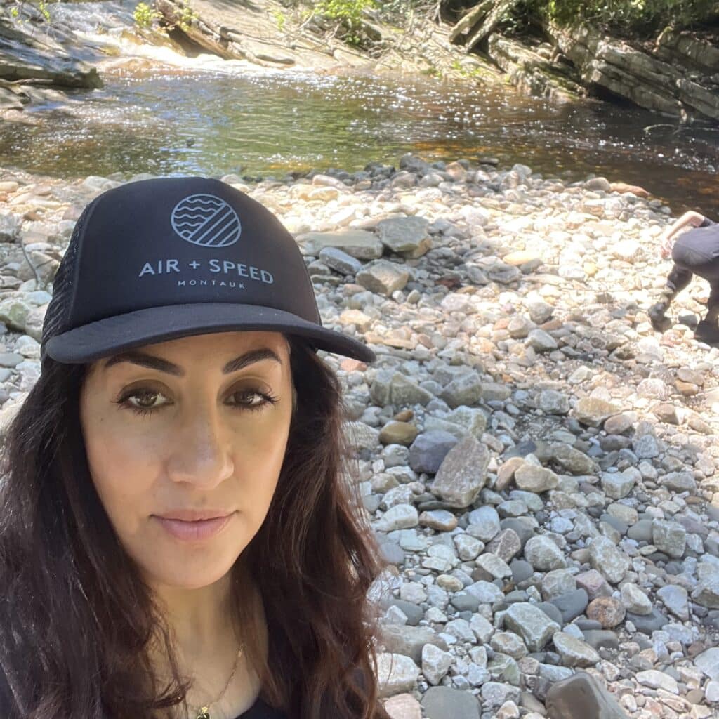 Lily Hudson selfie by a lake