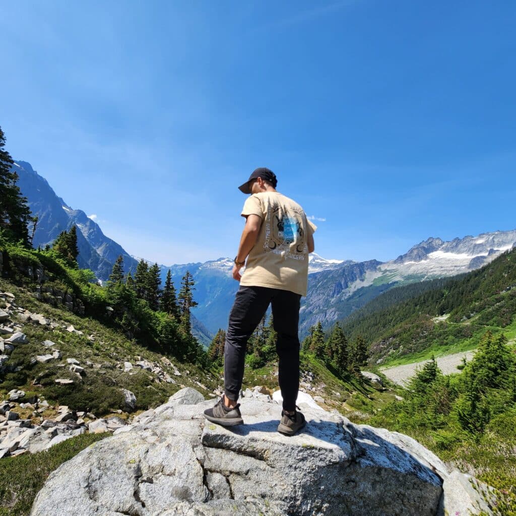 Tony Ng standing on a rock