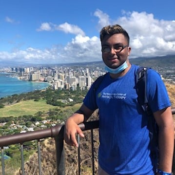 Neiladri Mallick on outlook in front of city skyline