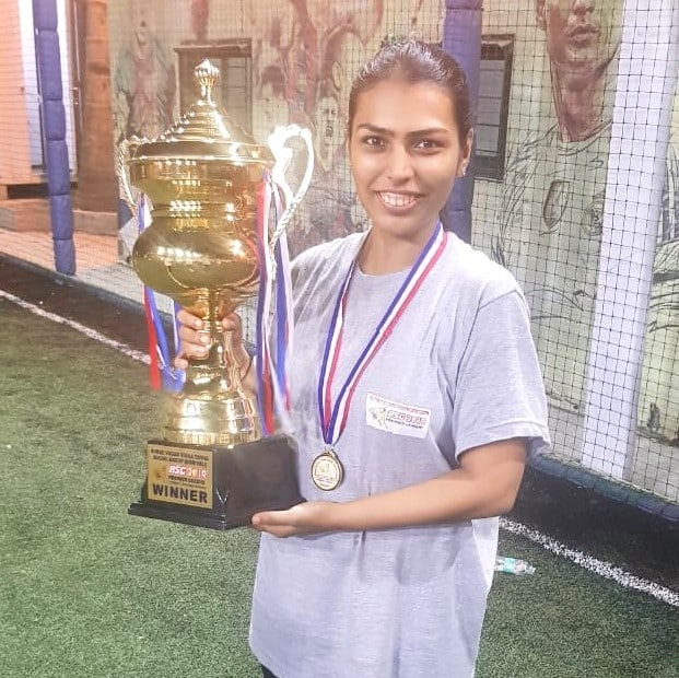 Nishi Shah with winners trophy