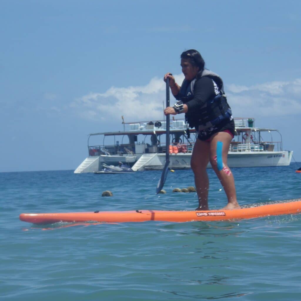 Polimarta Rubenstein paddleboarding