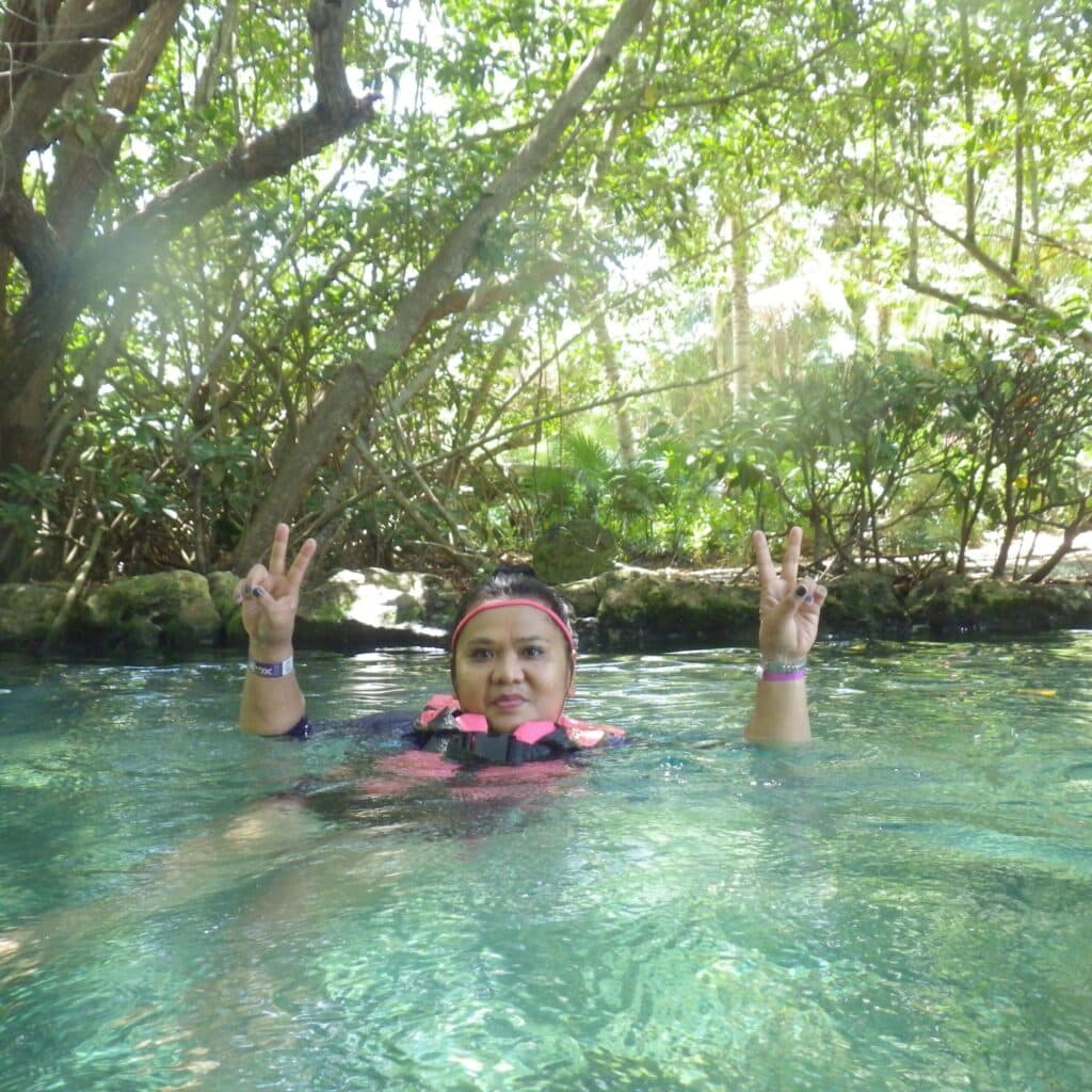 Polimarta Rubenstein swimming in a lake