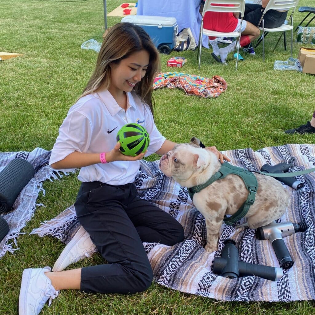 Rachael Song Playing with dog