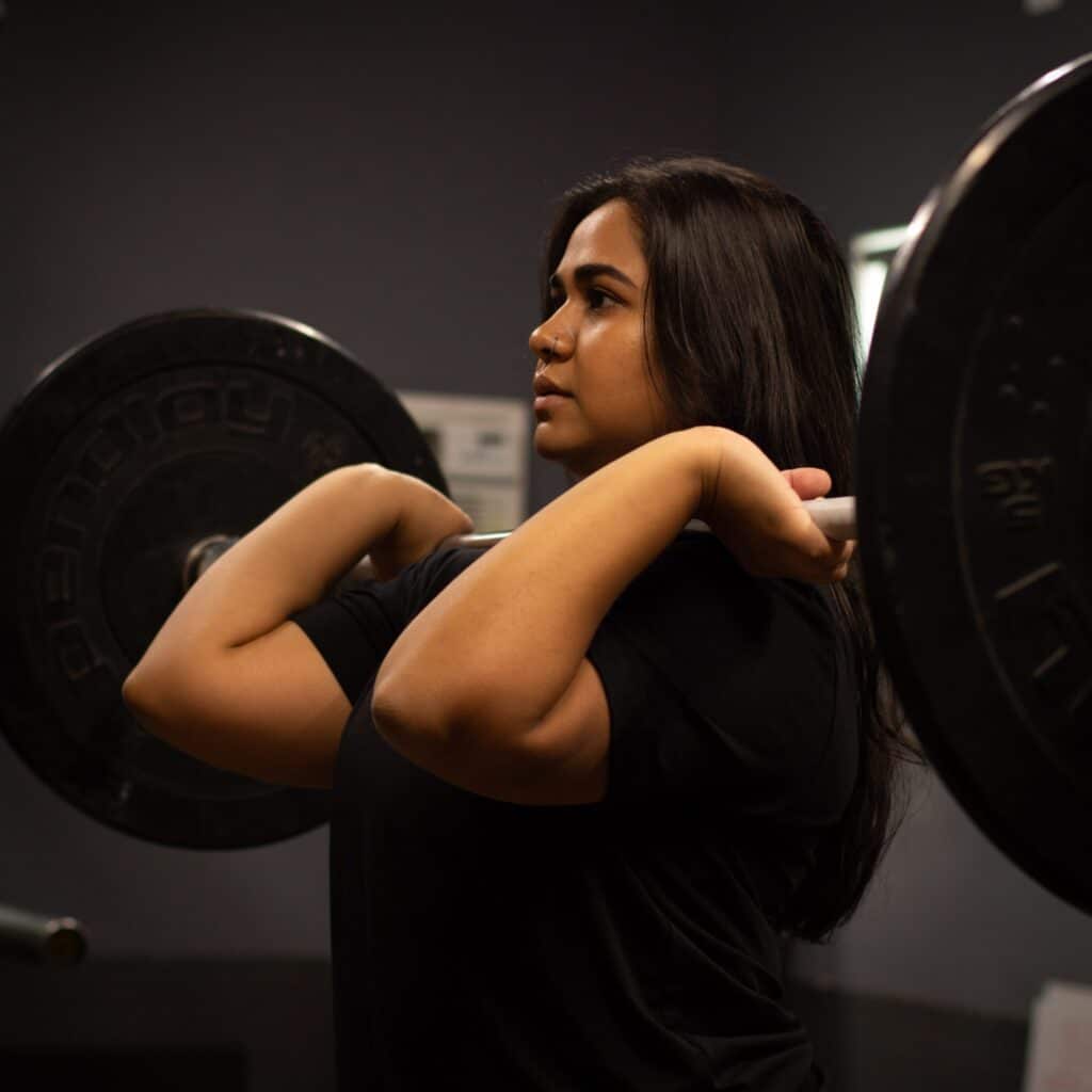 Radhika Patel weight lifting in gym