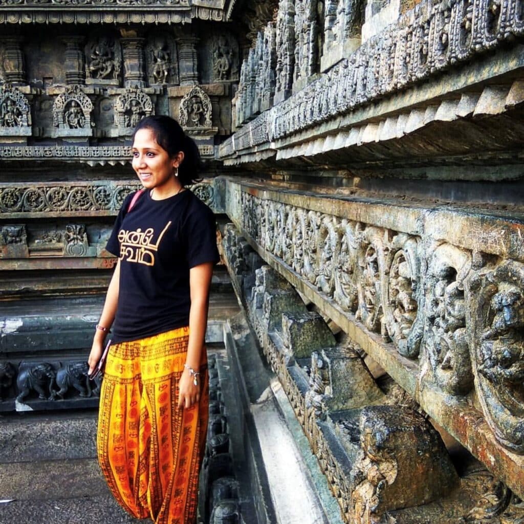 Ranjitha Mohan travel picture in front of ancient temple