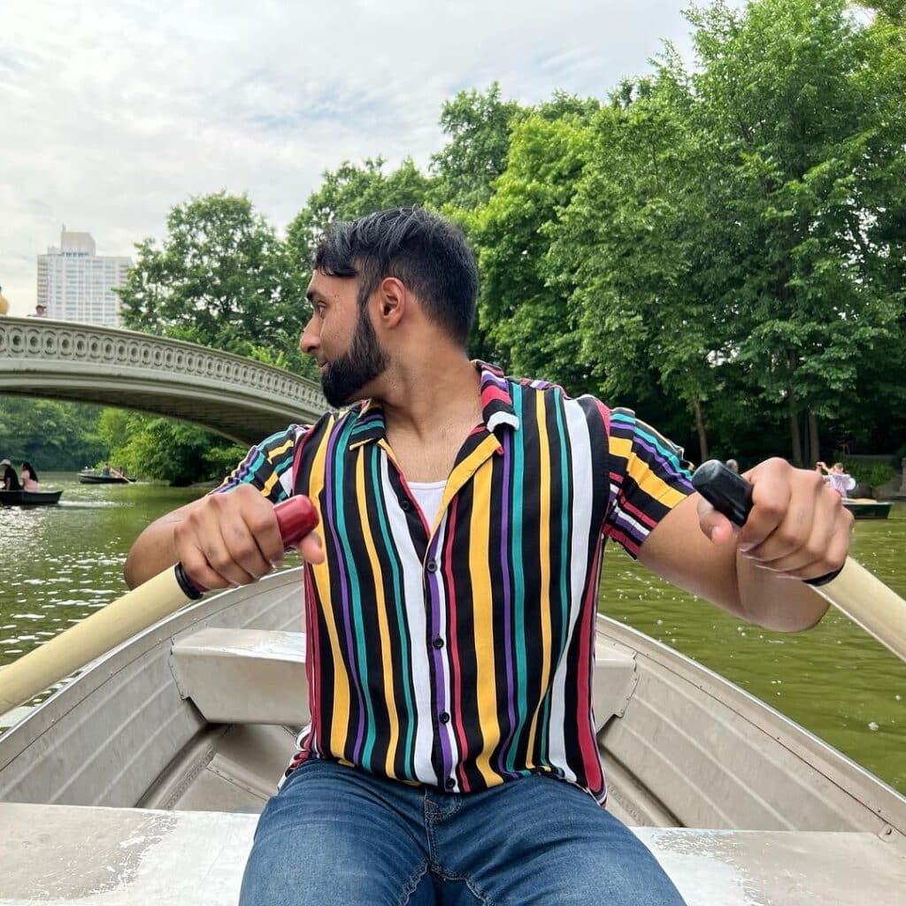 Ryan Bisumber in row boat on central park