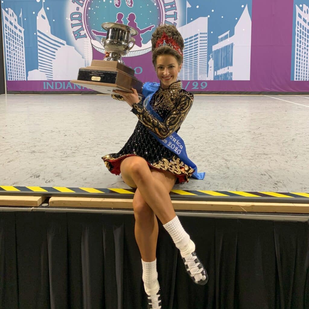 Samantha Meyers holding a dance trophy