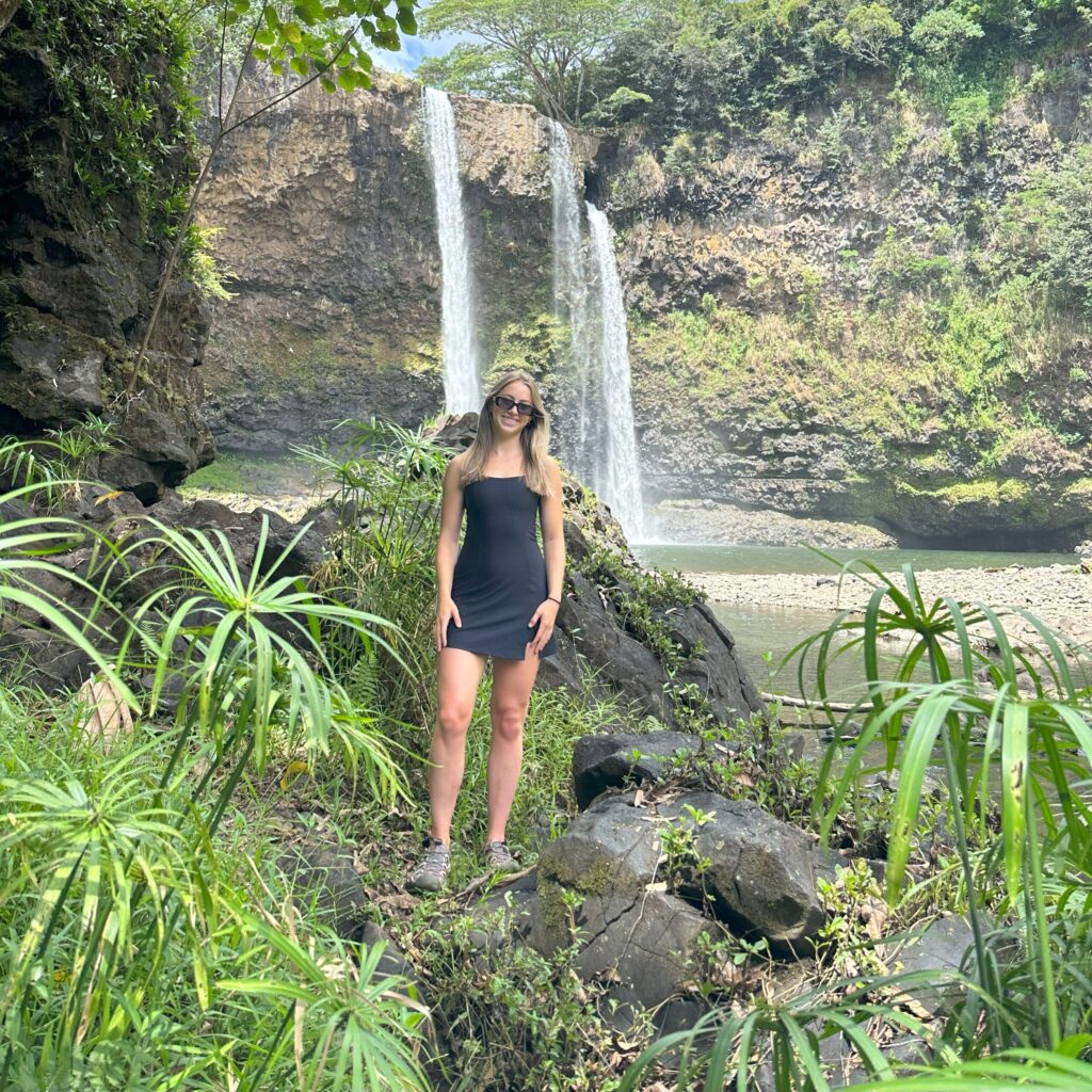 Samantha Meyers posing by a waterfall