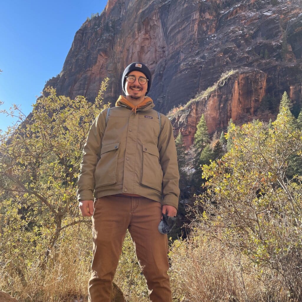 Steven Wechsler hiking a mountain