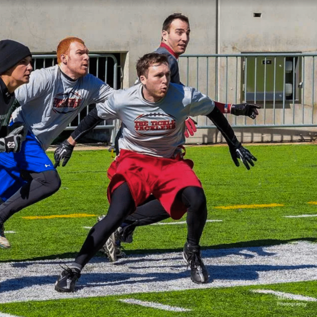 Zach Cogavin playing football