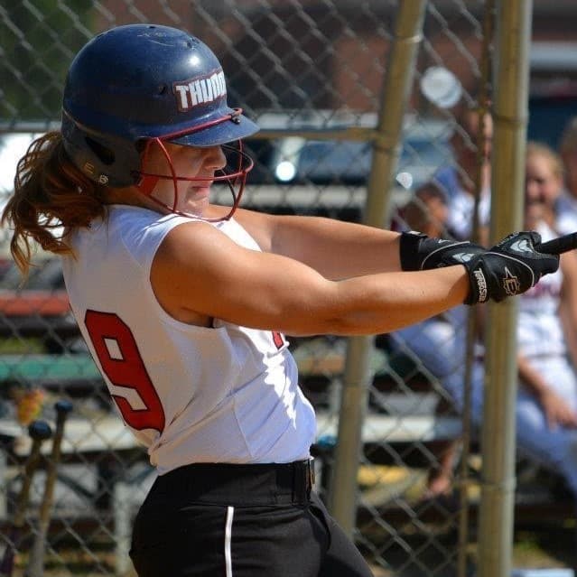 Erica Aborlleile playing baseball