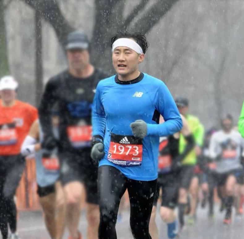 Jay Kwon running a race in rain