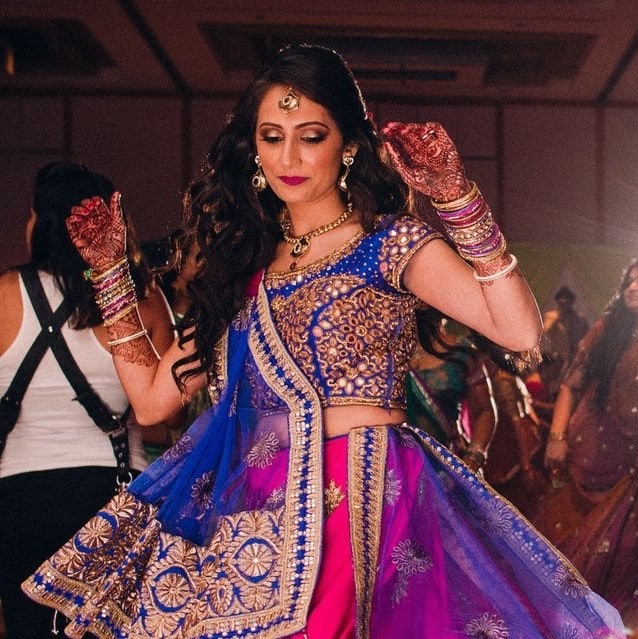 Sheena Shah dancing in traditional clothes