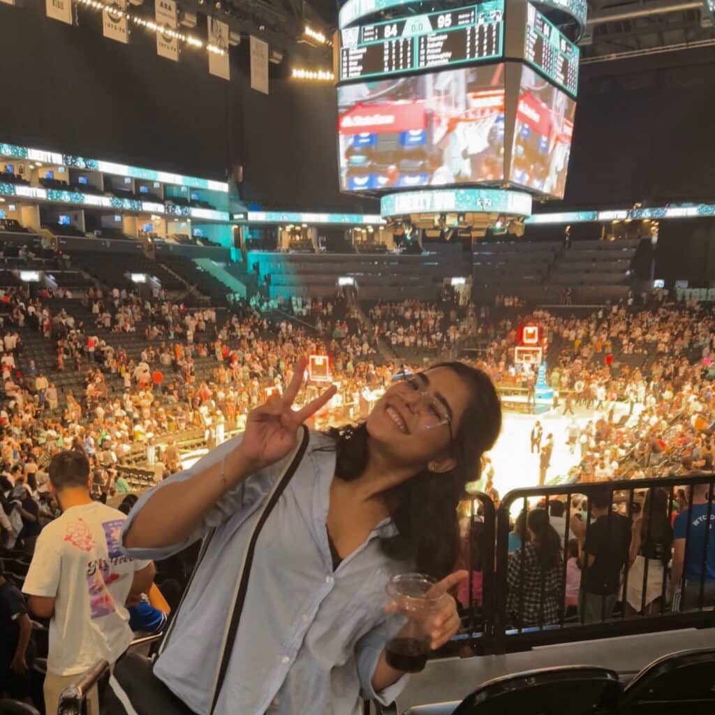 shrusti mehta at a basketball game