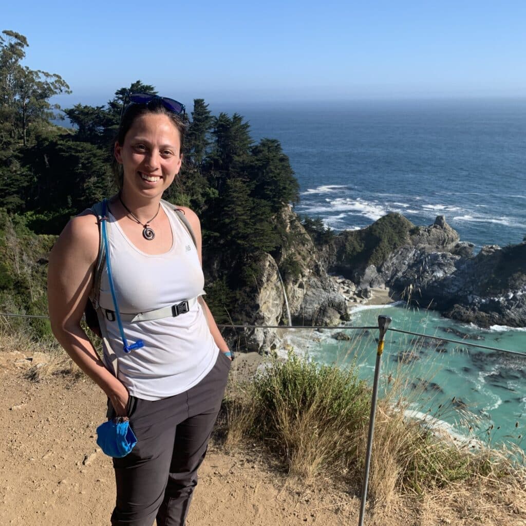 Emily Prader in front of a waterfall