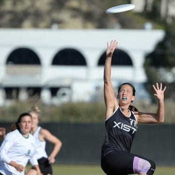 Emily Prader playing ultimate frisbee