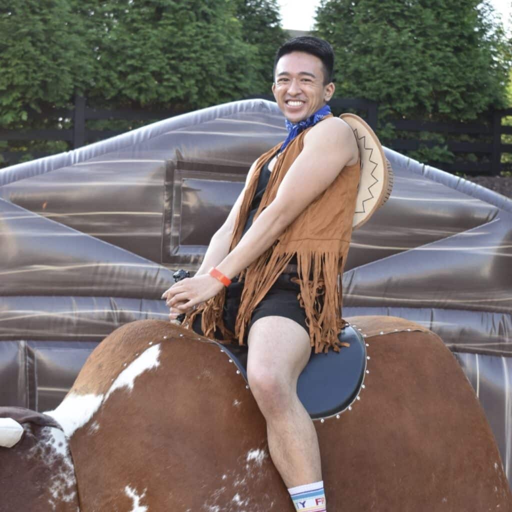 Joren Francisco riding a mechanical bull