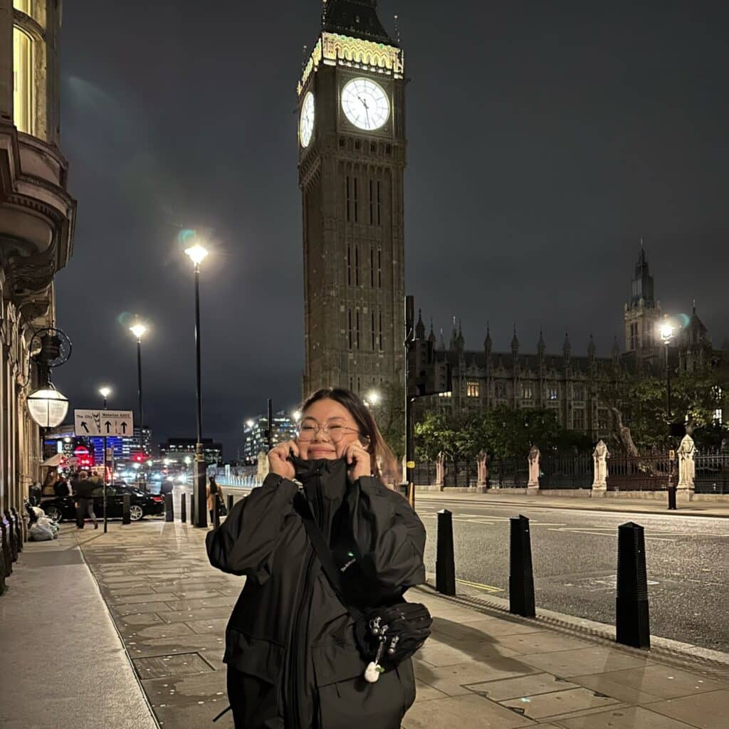 Joanne Chen in front of the big ben clock tower