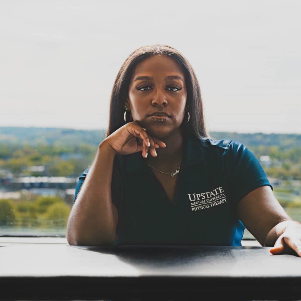 Jocelyn Lindsay at a desk in class