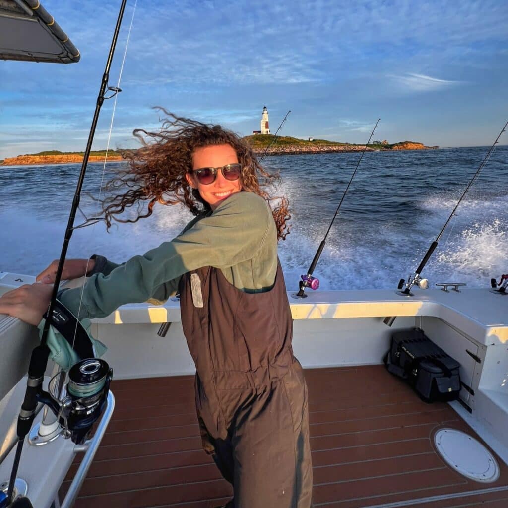 Shelby Welton driving a boat