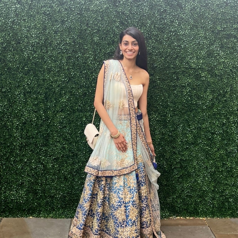 Riya Shah wearing a dress