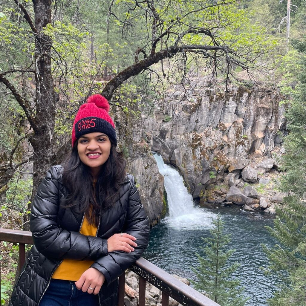 Alpika Jain overlooking a waterfall