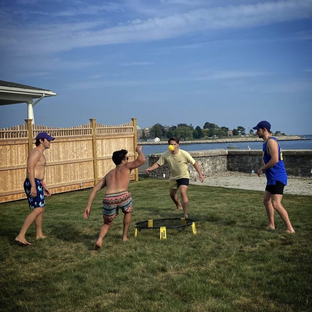 Brandon Barquin playing spikeball with friends