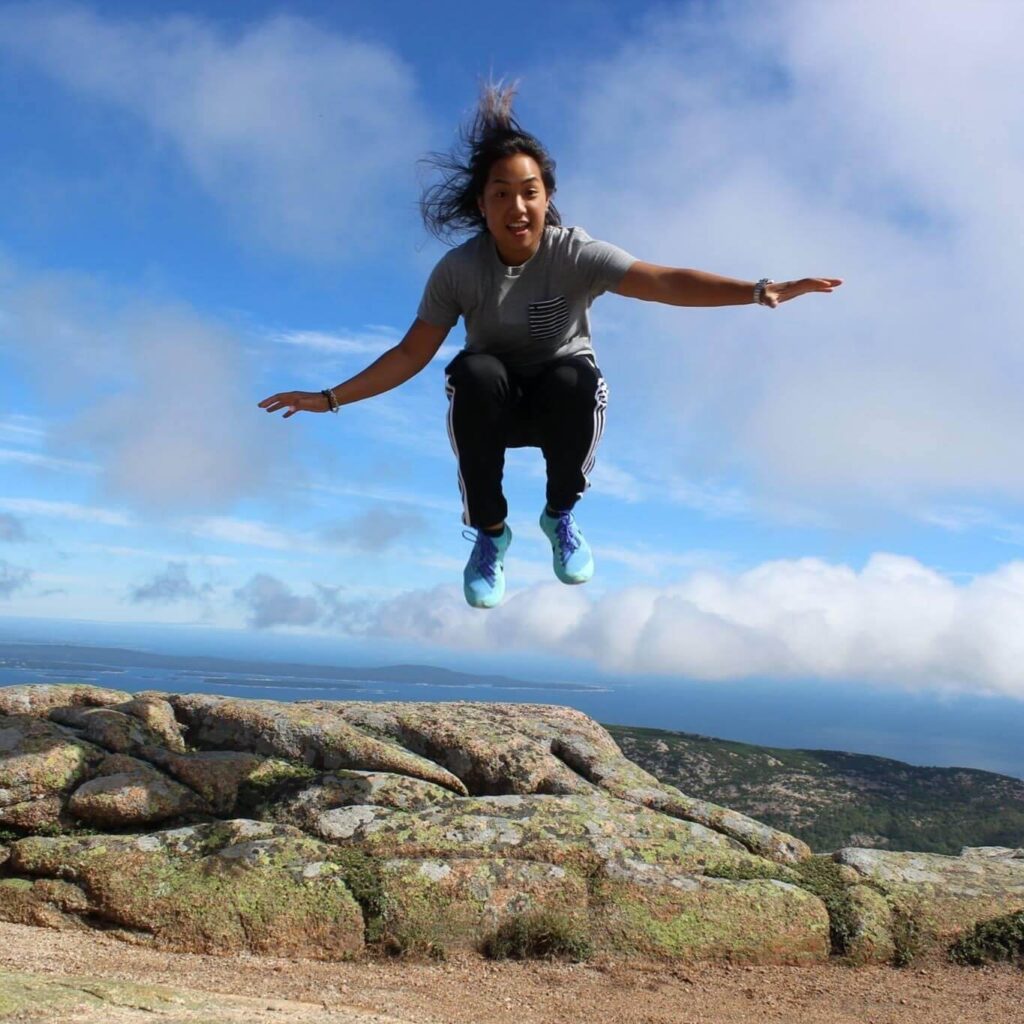 Cara Chow jumping in the air