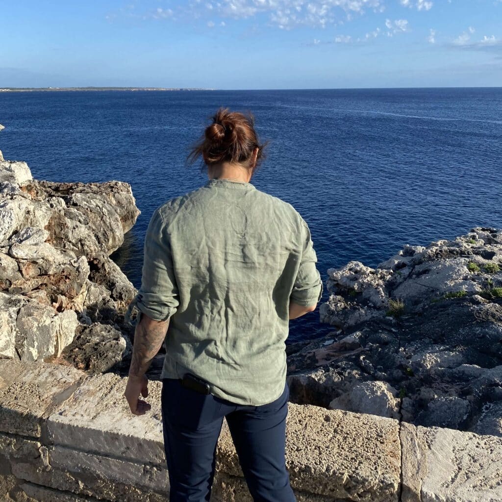 Cara Chow looking over the sea wall