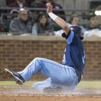 Gregory Cavaliere sliding in a baseball game