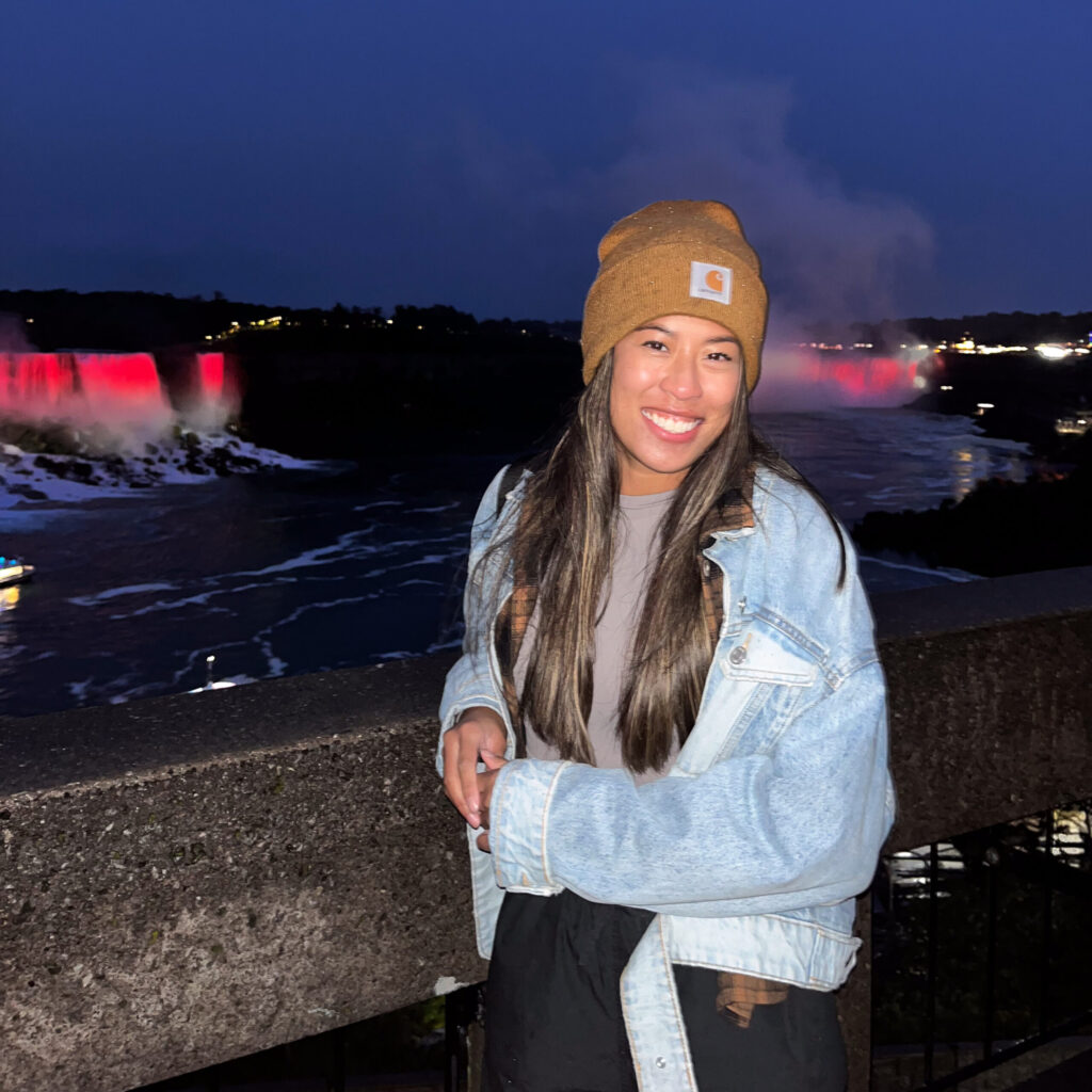 Tiffany Mak at a pier at night