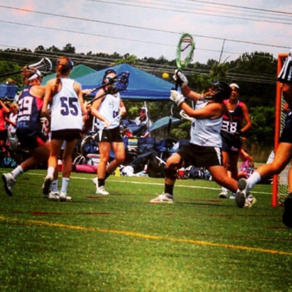 Jacquelyn Albanese playing lacrosse