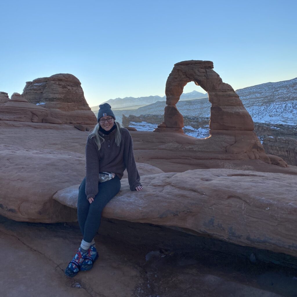 Kelsey Contreras sitting on a mountain