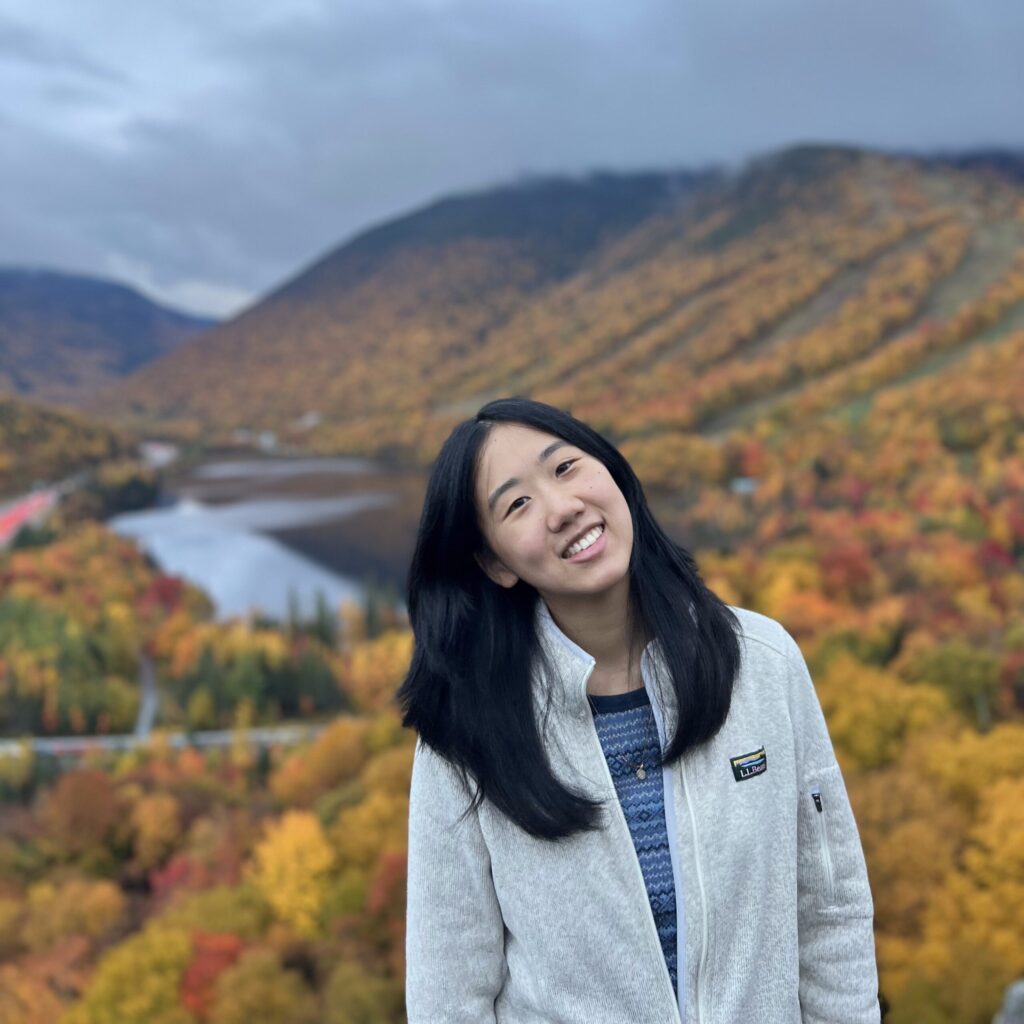 Lucy Zeng in a field