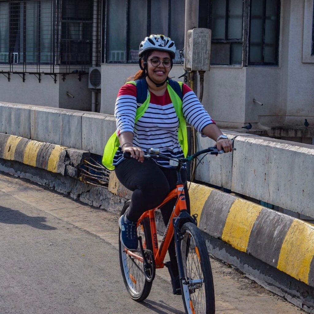 Megha Padhiar riding a bike