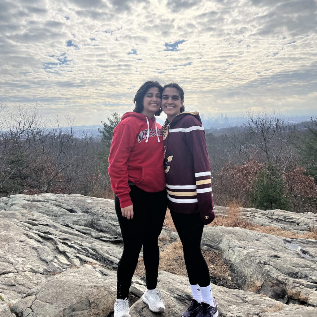 Niyati Parikh on a rock with her girlfriend