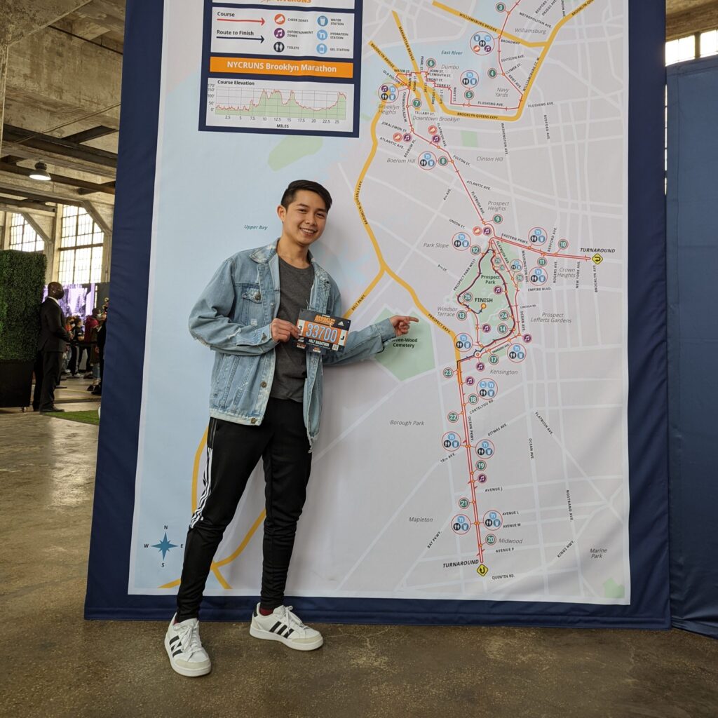 Rafael Gaerlan in front of a subway map