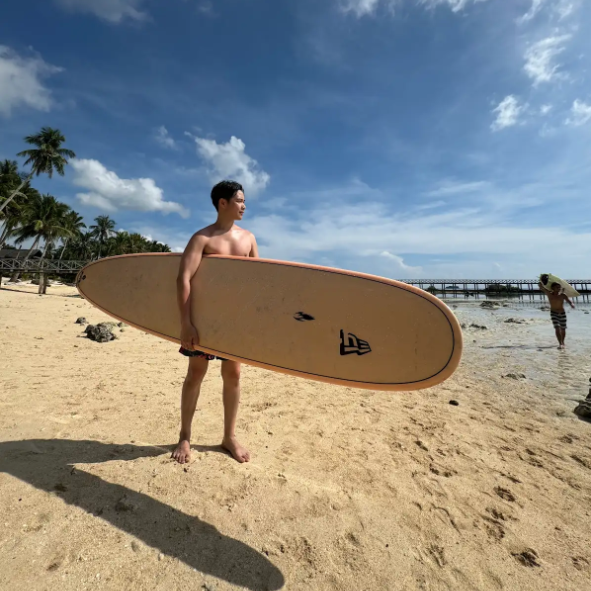 Rafael Gaerlan surfing