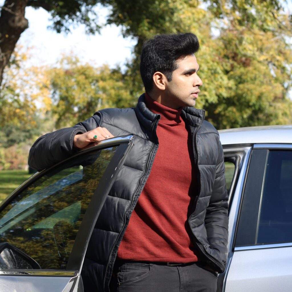 SHASHANK MISHRA getting out of a car