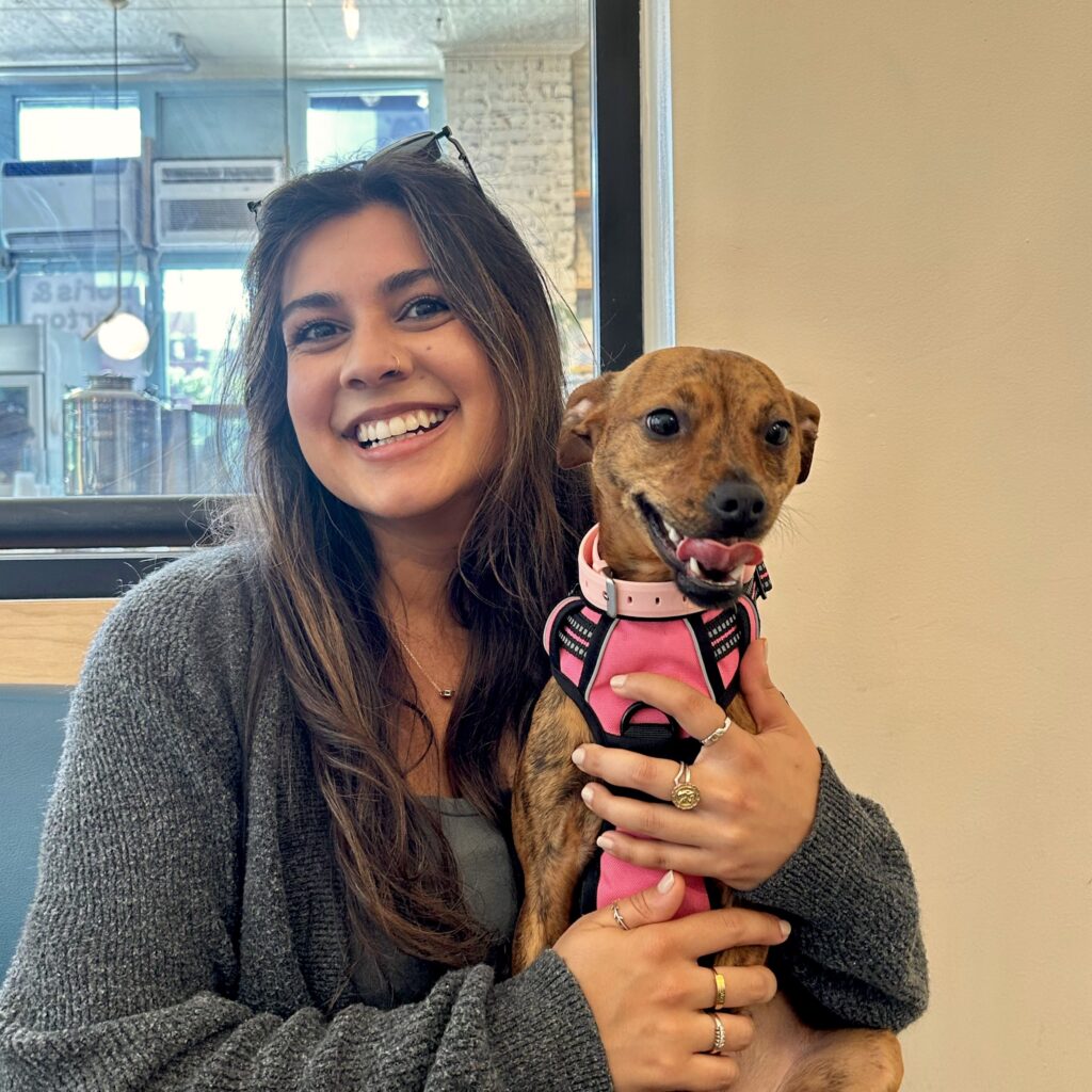 Samiya Massani holding her dog